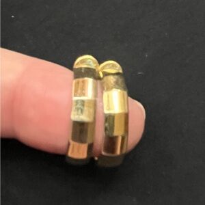 Checkered huggie hoop earrings.